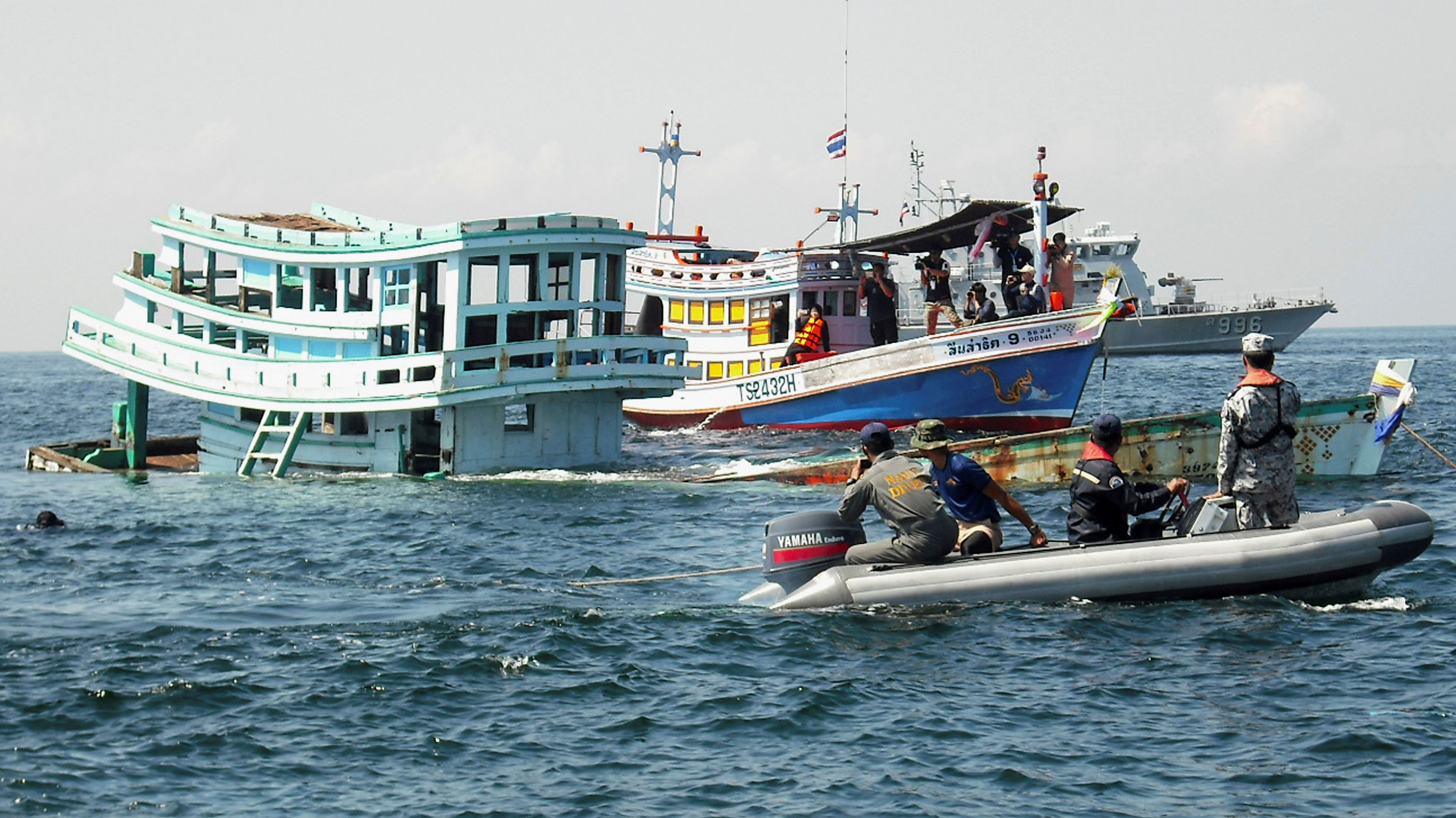An illegal fishing boat, seized by Thai officials, sinks off the coast of Phetchaburi province, Thailand. An illegal fishing boat, seized by Thai officials, sinks off the coast of Phetchaburi province, Thailand.